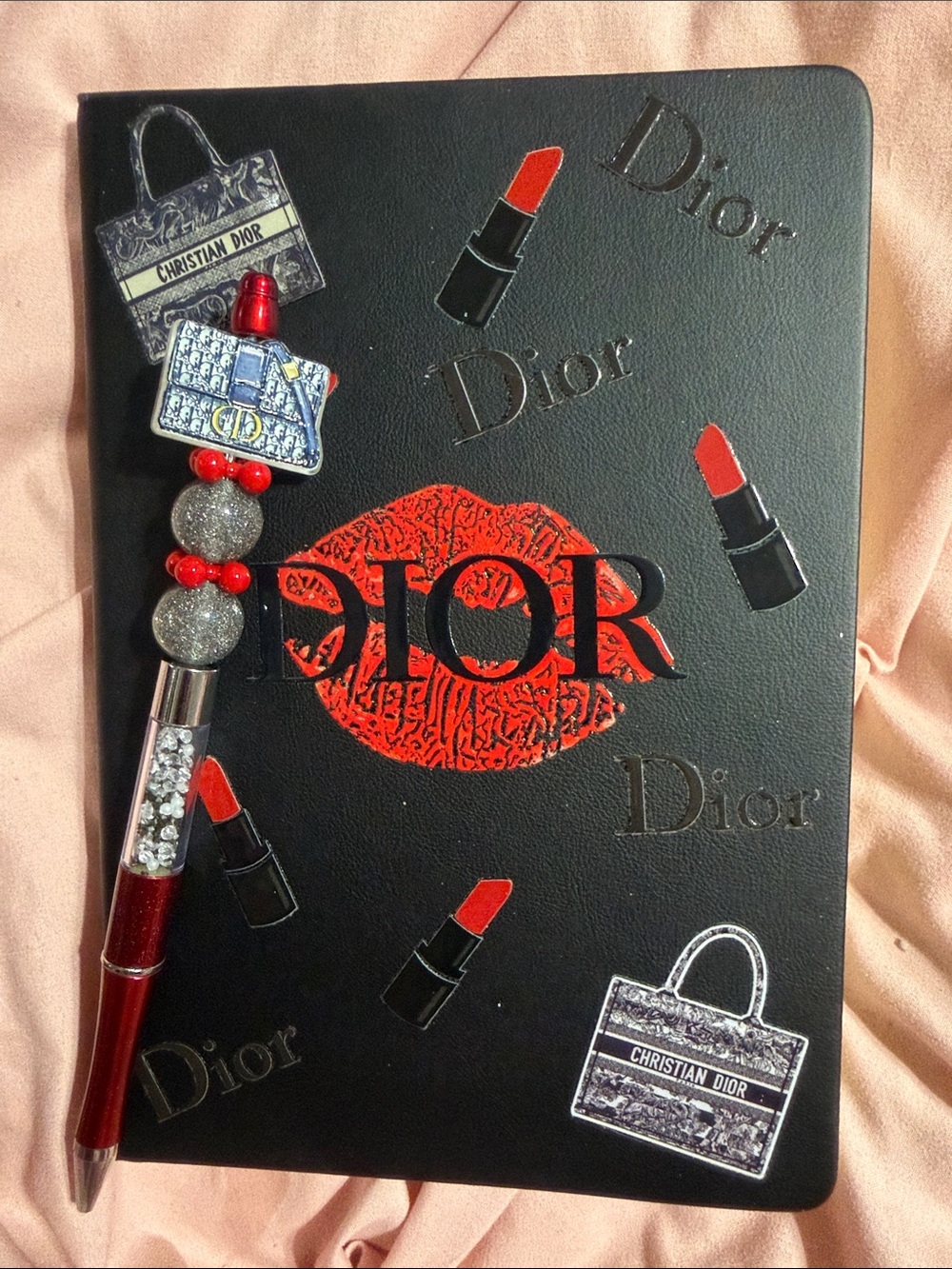Black journal with matching pen.